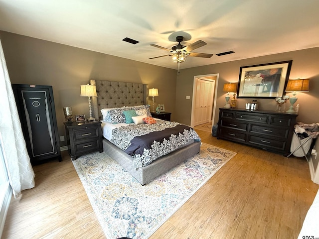 18872 Big Timber Rd, Tyler, TX 75703 - bedroom with light wood finished floors and ceiling fan