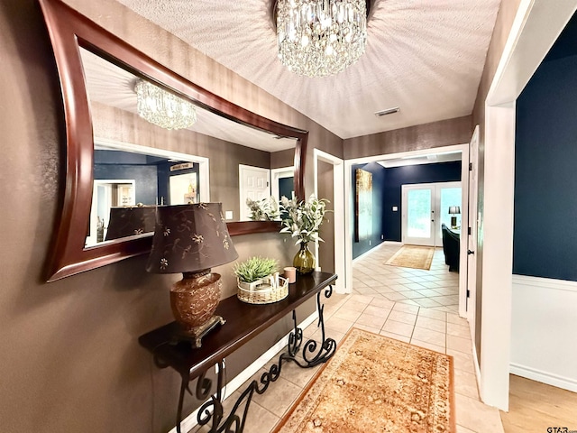 18872 Big Timber Rd, Tyler, TX 75703 - hall featuring a chandelier and tile patterned flooring