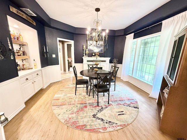 18872 Big Timber Rd, Tyler, TX 75703 - dining room with a chandelier and light wood finished floors