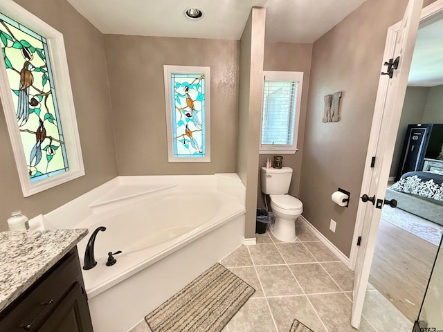 18872 Big Timber Rd, Tyler, TX 75703 - full bathroom with a bath, tile patterned flooring, vanity, and ensuite bathroom