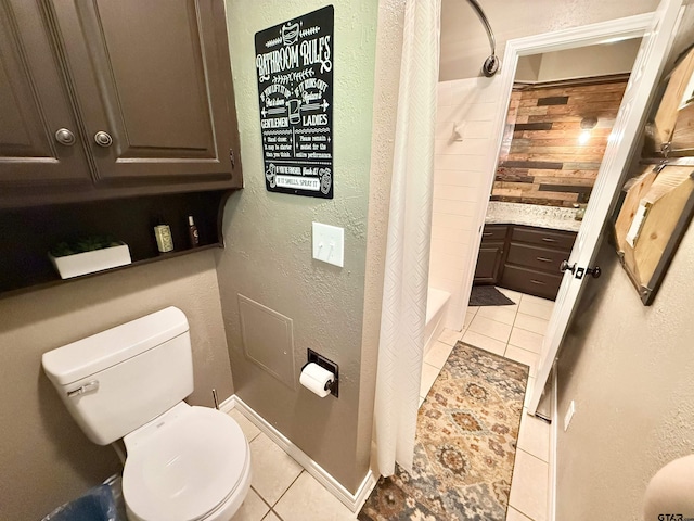 18872 Big Timber Rd, Tyler, TX 75703 - bathroom with tile patterned flooring, shower / bath combo, and a textured wall