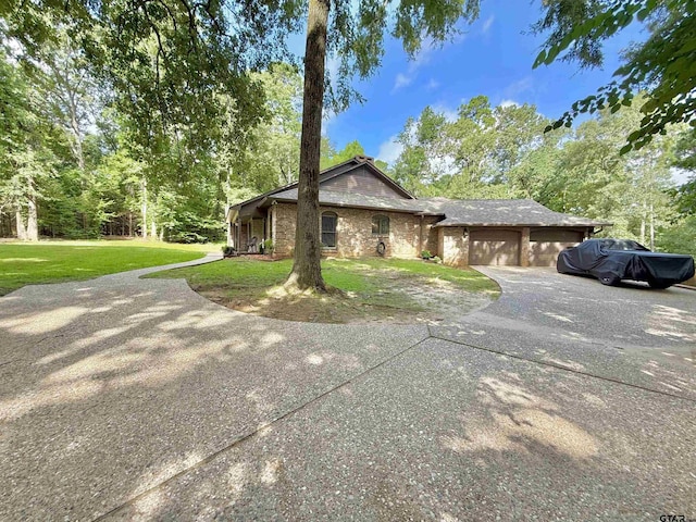 18872 Big Timber Rd, Tyler, TX 75703 - view of front of property with a front yard, a garage, and driveway