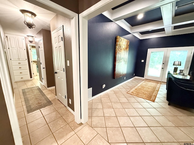 18872 Big Timber Rd, Tyler, TX 75703 - entrance foyer featuring light tile patterned flooring, beamed ceiling, french doors, and coffered ceiling