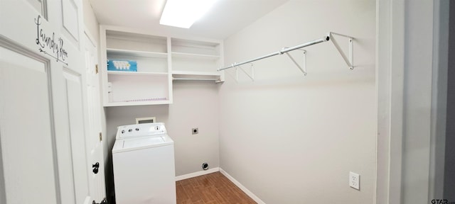 laundry room with laundry area, washer / dryer, dark wood-style flooring, and baseboards