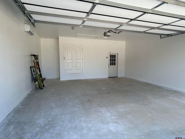 garage featuring a garage door opener and a wall mounted AC