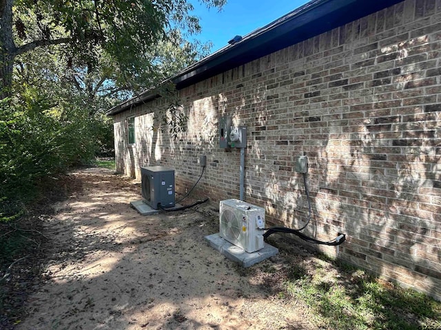 view of property exterior with ac unit