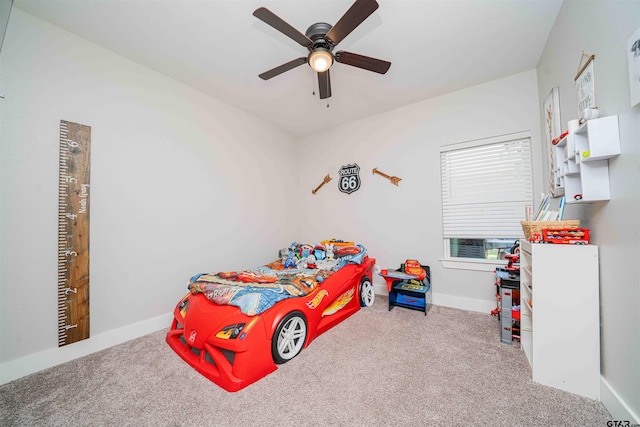 107 Hay Meadow Dr, Winona, TX 75792 - bedroom featuring carpet floors, ceiling fan, and baseboards
