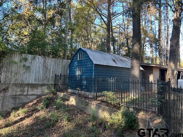 exterior space with a fenced backyard