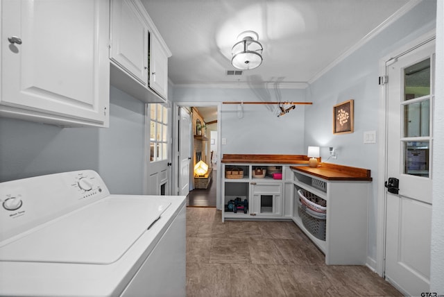 1430 Wavely St, Tyler, TX 75701 - washroom featuring washer / clothes dryer, cabinet space, and ornamental molding