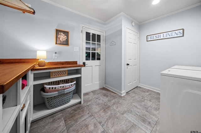 1430 Wavely St, Tyler, TX 75701 - laundry area with crown molding, washer and clothes dryer, baseboards, and light stone finish flooring