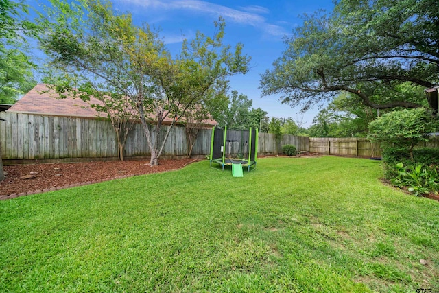 1430 Wavely St, Tyler, TX 75701 - view of yard with a trampoline