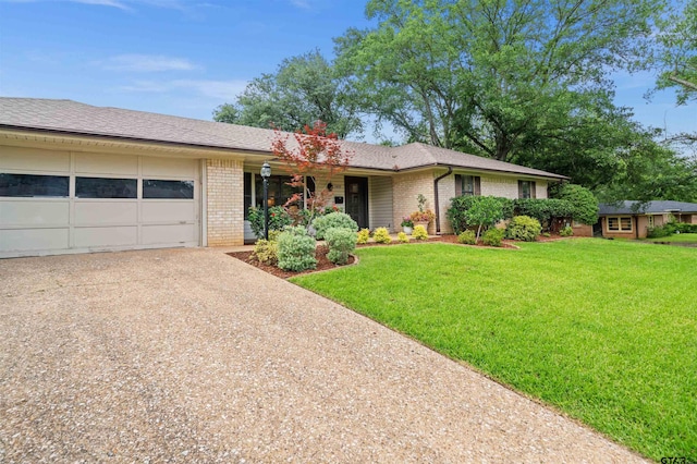 1430 Wavely St, Tyler, TX 75701 - single story home featuring brick siding, driveway, and a front yard