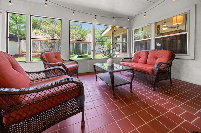 1430 Wavely St, Tyler, TX 75701 - sunroom featuring track lighting, an outdoor living space, and tile patterned floors