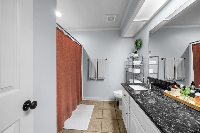 1430 Wavely St, Tyler, TX 75701 - bathroom with crown molding, toilet, vanity, tile patterned floors, and baseboards