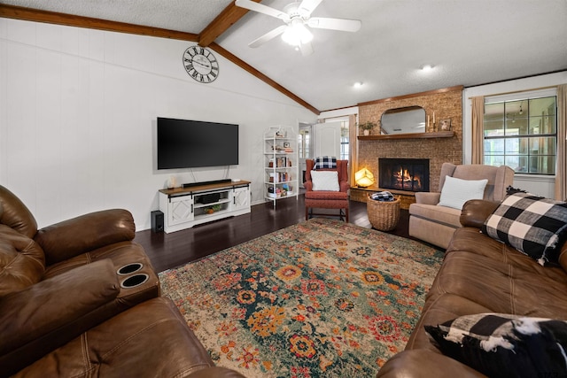 1430 Wavely St, Tyler, TX 75701 - living room featuring wood finished floors, a ceiling fan, a fireplace, and crown molding