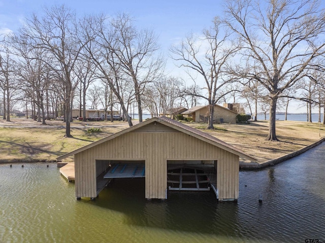 dock area with a water view