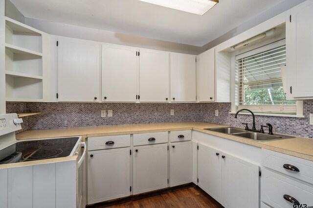 kitchen featuring white cabinetry, dark wood-type flooring, sink, and white electric range oven