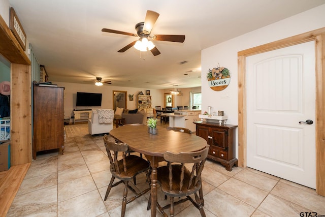 12545 Fm 968 W, Longview, TX 75602 - dining area featuring ceiling fan and light tile patterned flooring