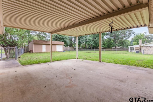 901 Dogwood St, Gilmer, TX 75644 - view of patio featuring an outbuilding and cooling unit