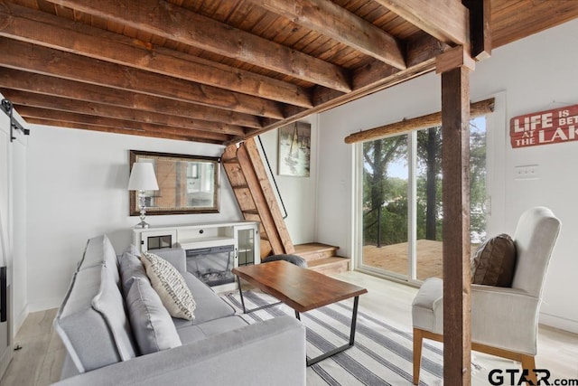 11020 Kevin Dr, Frankston, TX 75763 - living room featuring wooden ceiling with exposed beams and light wood-style flooring