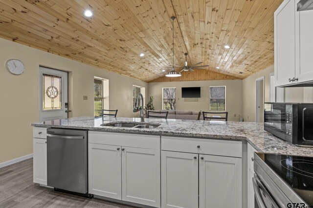 2106 Fm 1647, Winnsboro, TX 75494 - kitchen with wood ceiling, vaulted ceiling, stainless steel dishwasher, white cabinets, and a sink