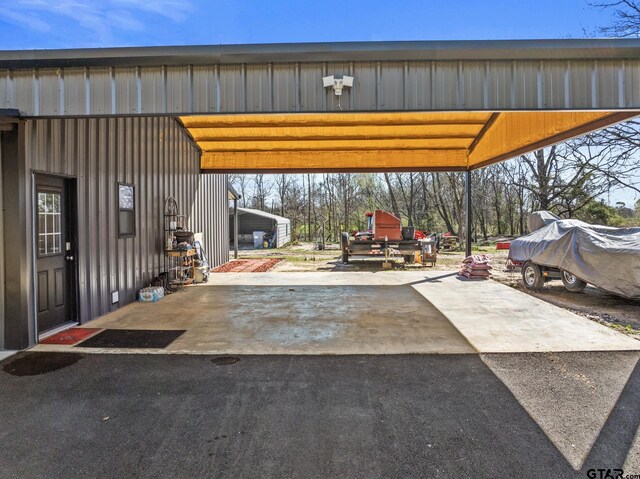 2106 Fm 1647, Winnsboro, TX 75494 - view of patio featuring aphalt driveway