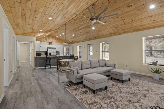 2106 Fm 1647, Winnsboro, TX 75494 - living area featuring wood finished floors, recessed lighting, wooden ceiling, baseboards, and ceiling fan