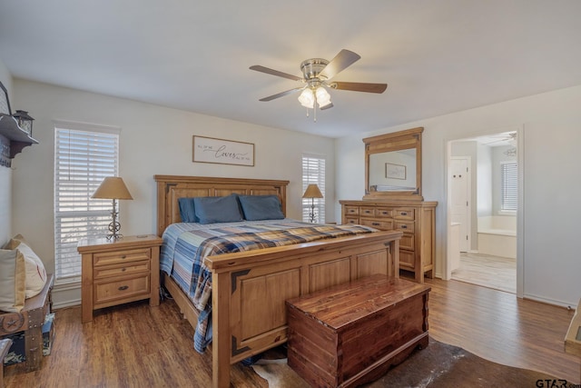 1650 Vz County Road 2512, Canton, TX 75103 - bedroom featuring dark wood-type flooring, connected bathroom, and ceiling fan
