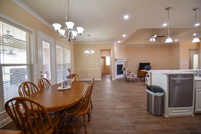 2222 Rana Park, Flint, TX 75762 - dining space with baseboards, ceiling fan with notable chandelier, a glass covered fireplace, ornamental molding, and dark wood-type flooring