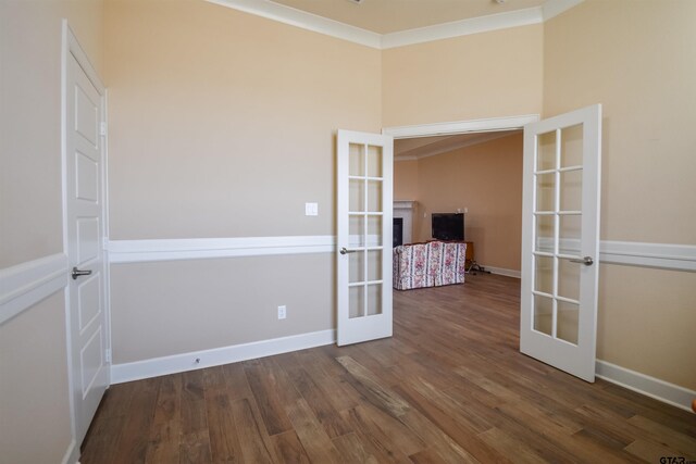 2222 Rana Park, Flint, TX 75762 - empty room with crown molding, baseboards, french doors, and wood finished floors