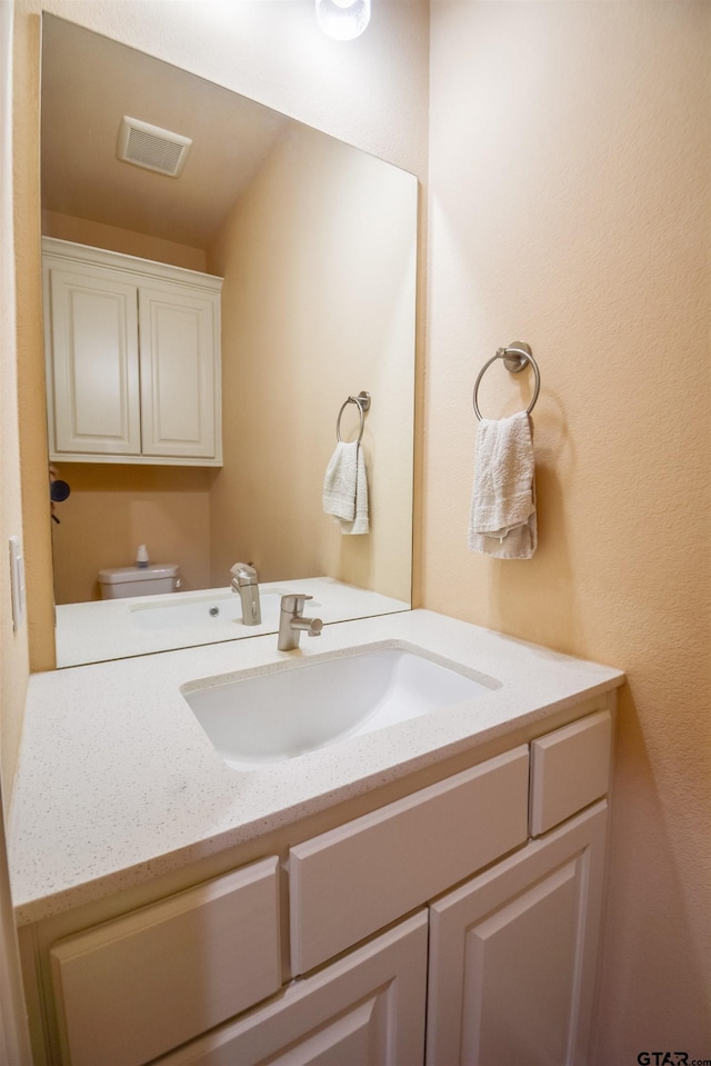 2222 Rana Park, Flint, TX 75762 - half bath with vanity, toilet, and visible vents