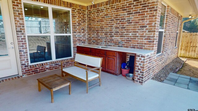 2222 Rana Park, Flint, TX 75762 - view of patio with fence and a sink