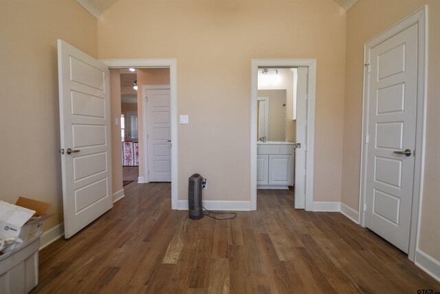 2222 Rana Park, Flint, TX 75762 - unfurnished bedroom with baseboards, vaulted ceiling, and wood finished floors