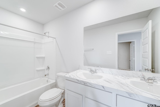 full bathroom with shower / washtub combination, toilet, and vanity