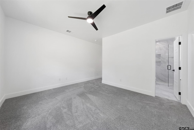 carpeted empty room with ceiling fan