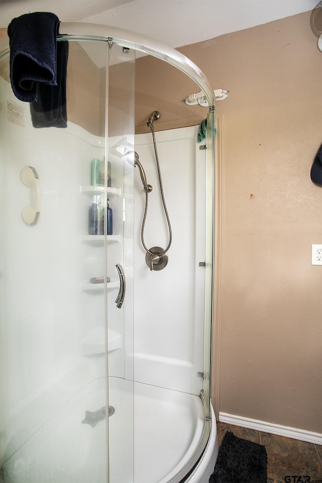 811 Janis, Bullard, TX 75757 - bathroom featuring a stall shower and baseboards