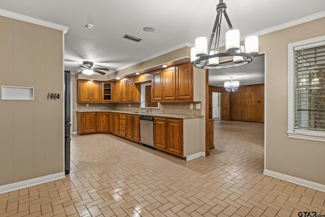1108 Quitman, Pittsburg, TX 75686 - kitchen featuring a chandelier, dishwasher, brown cabinets, a sink, and brick patterned flooring