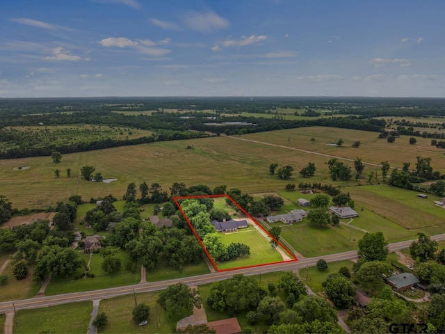 1108 Quitman, Pittsburg, TX 75686 - aerial view of sparsely populated area featuring property parcel outlined and a pastoral area