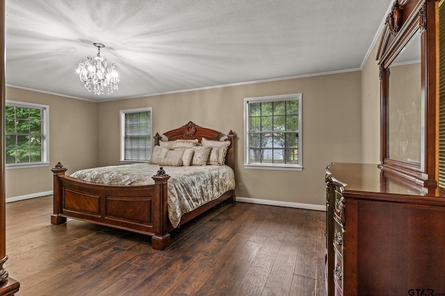 1108 Quitman, Pittsburg, TX 75686 - bedroom featuring baseboards, multiple windows, a chandelier, and ornamental molding