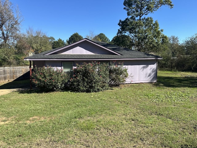 view of property exterior featuring a yard