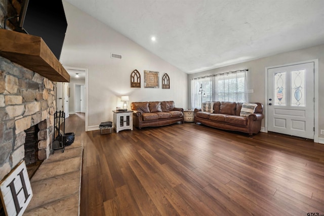 living room with high vaulted ceiling, a fireplace, and dark hardwood / wood-style flooring