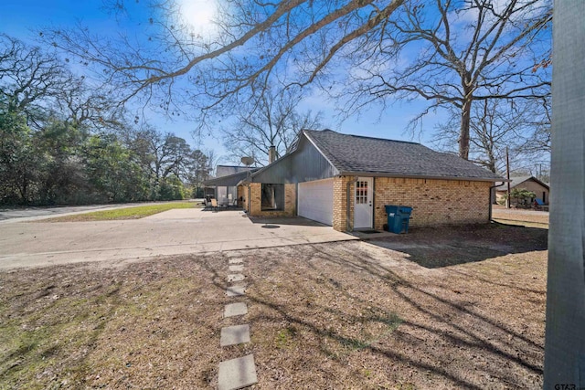 view of home's exterior with a garage