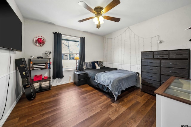 bedroom featuring dark wood-type flooring and ceiling fan