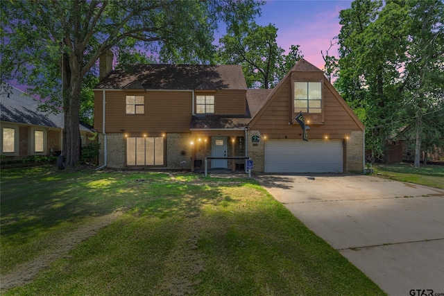 1304 Azalea Dr, Sulphur Springs, TX 75482 - view of front of property featuring brick siding, driveway, a lawn, and an attached garage