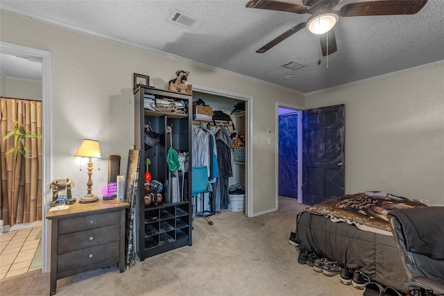 1304 Azalea Dr, Sulphur Springs, TX 75482 - bedroom featuring carpet, ornamental molding, a textured ceiling, and ceiling fan