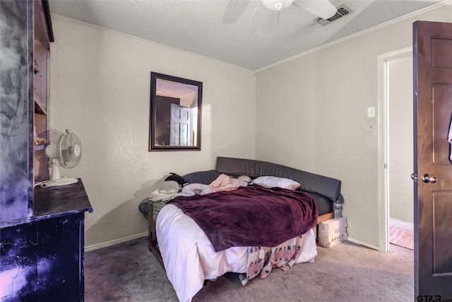 1304 Azalea Dr, Sulphur Springs, TX 75482 - bedroom with crown molding, a textured ceiling, carpet, and ceiling fan
