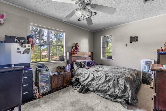 1304 Azalea Dr, Sulphur Springs, TX 75482 - carpeted bedroom featuring a textured ceiling, crown molding, multiple windows, a textured wall, and a ceiling fan