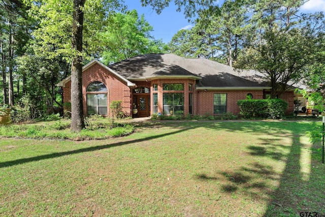 19132 Falls Creek Dr, Flint, TX 75762 - single story home featuring a shingled roof, brick siding, and a front yard
