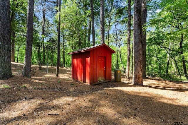 19132 Falls Creek Dr, Flint, TX 75762 - view of shed featuring a forest view