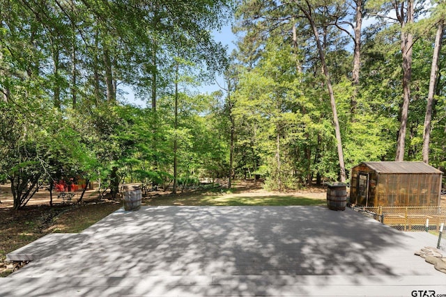 19132 Falls Creek Dr, Flint, TX 75762 - view of patio featuring an outdoor structure